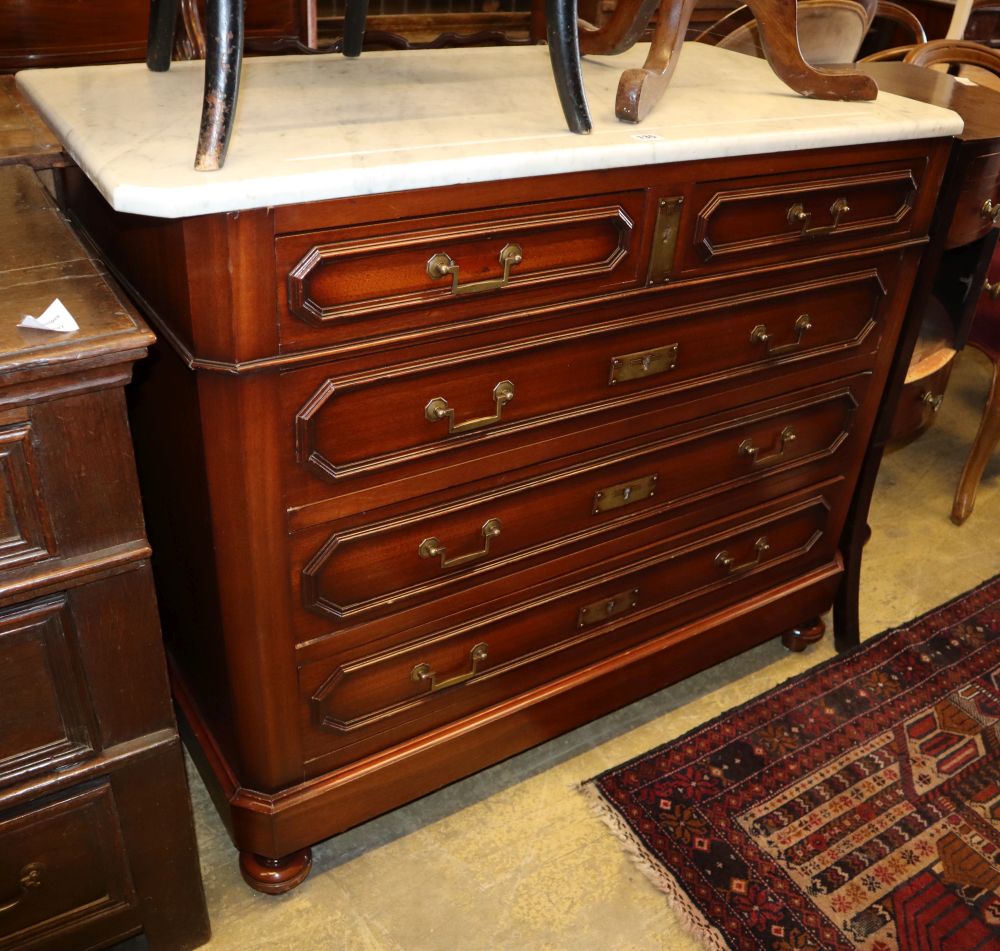 An early 20th century French marble top mahogany commode, W.105cm, D.53cm, H.88cm